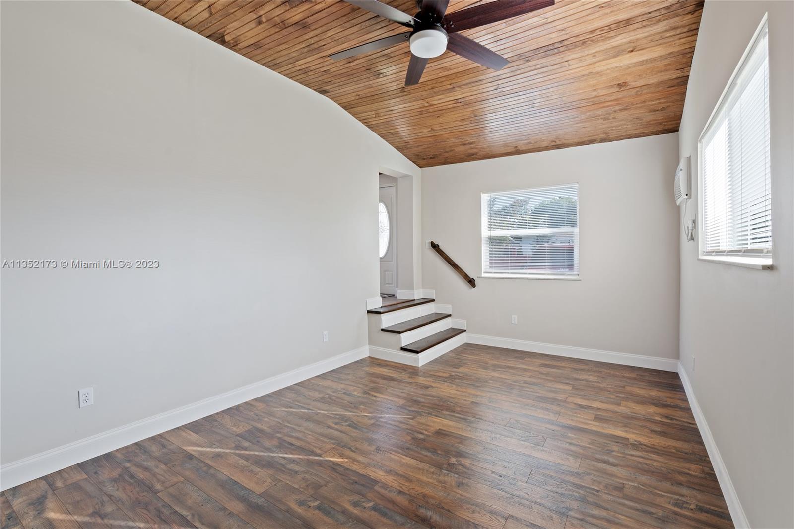 5571 Southwest 5th Terrace Miami, FL 33134 - Photo 17 of 37 wooden floor in an empty room with a window