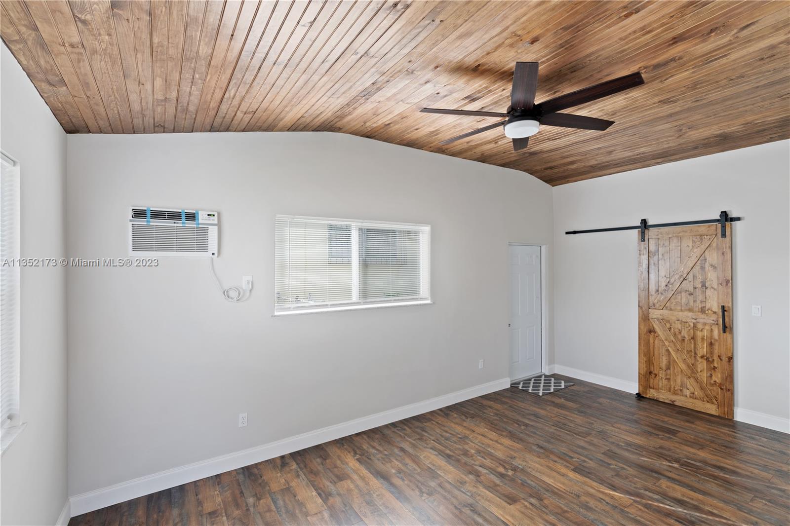 5571 Southwest 5th Terrace Miami, FL 33134 - Photo 18 of 37 a view of hallway with wooden floor