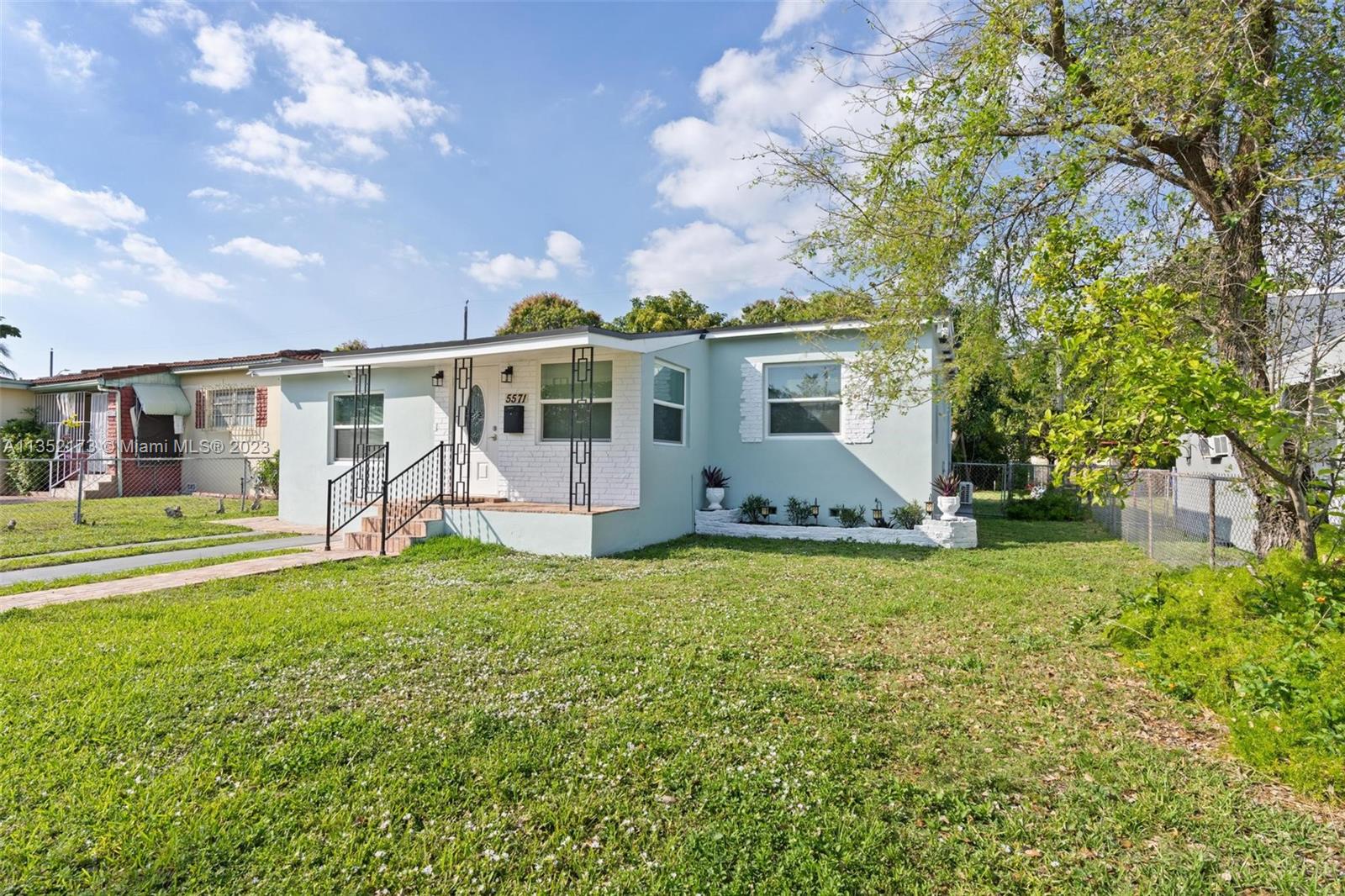 5571 Southwest 5th Terrace Miami, FL 33134 - Photo 2 of 37 a view of a house with a backyard
