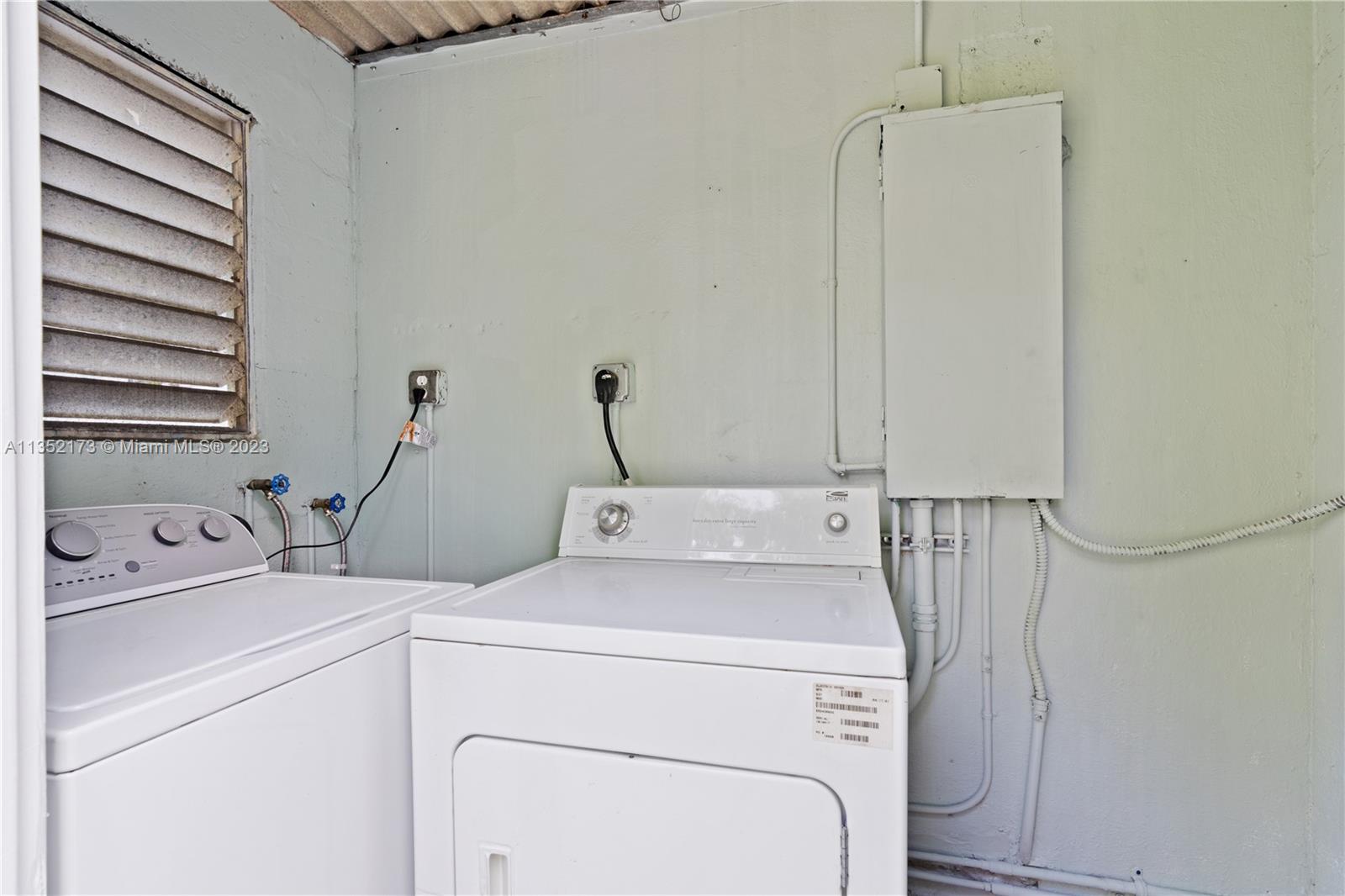 5571 Southwest 5th Terrace Miami, FL 33134 - Photo 23 of 37 a utility room with dryer and washer