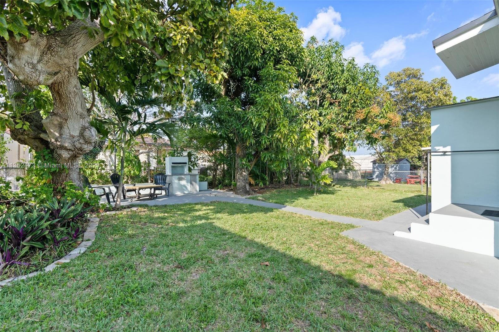 5571 Southwest 5th Terrace Miami, FL 33134 - Photo 26 of 37 a view of backyard with swimming pool