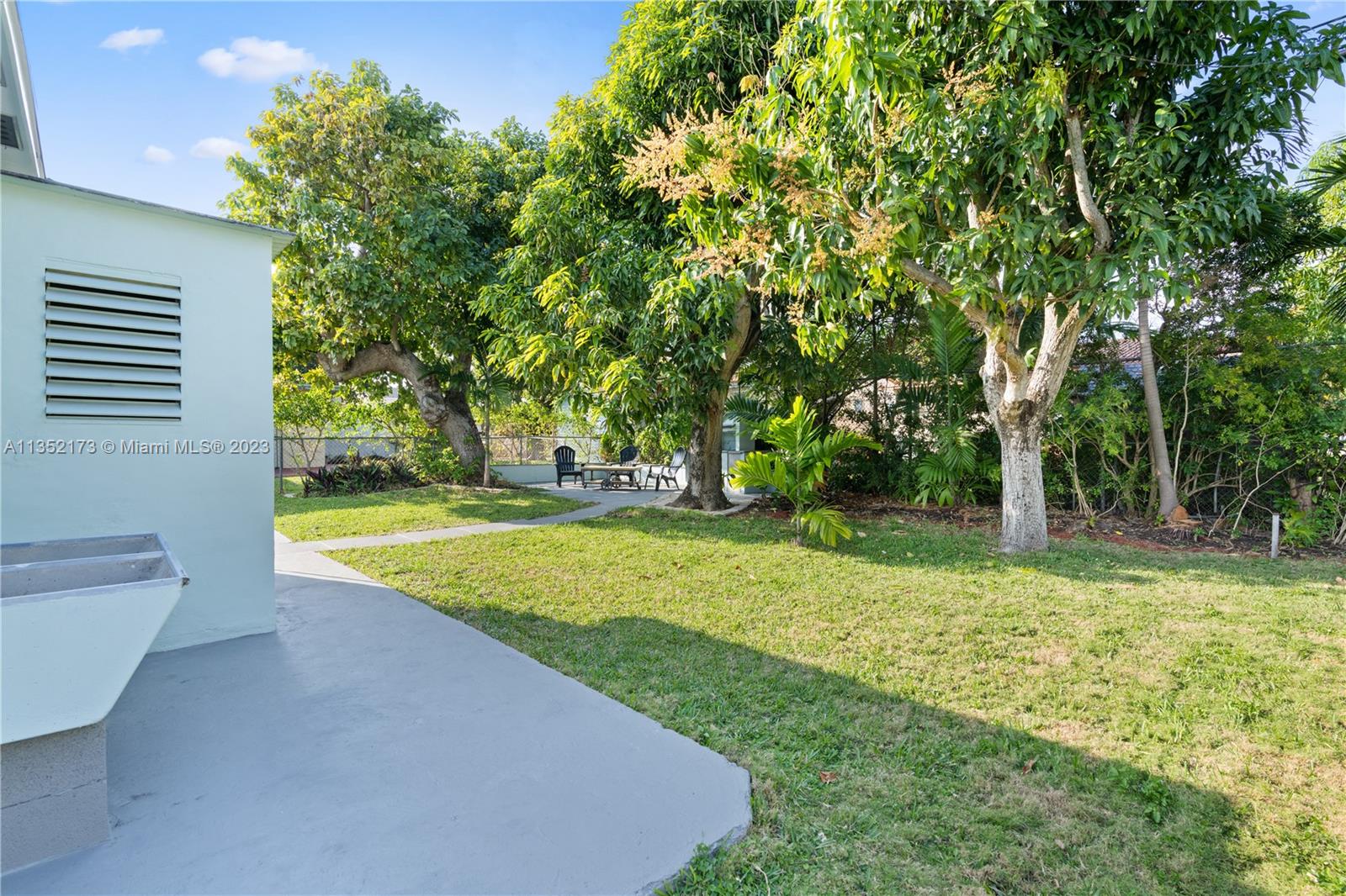 5571 Southwest 5th Terrace Miami, FL 33134 - Photo 27 of 37 a view of a backyard with large trees