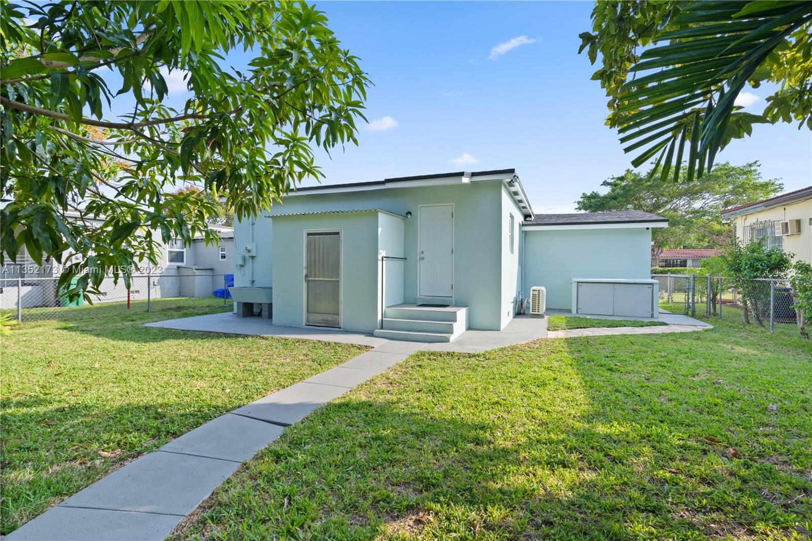 5571 Southwest 5th Terrace Miami, FL 33134 - Photo 29 of 37 a front view of house with yard and trees