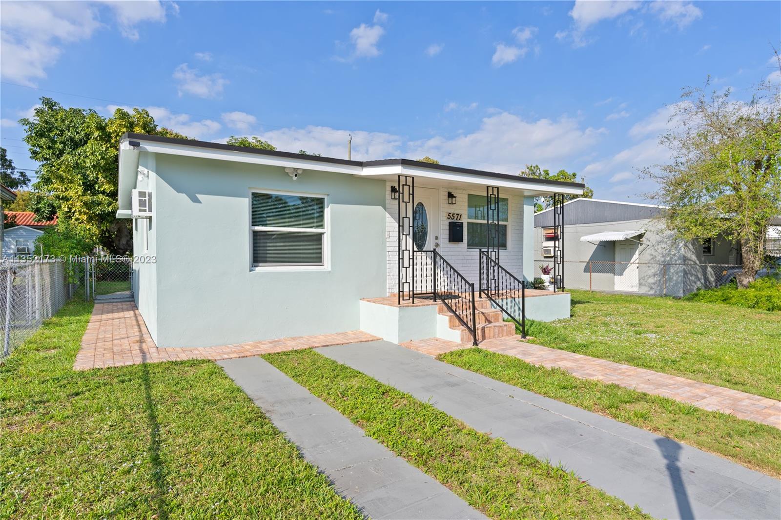 5571 Southwest 5th Terrace Miami, FL 33134 - Photo 34 of 37 a front view of house with yard and green space