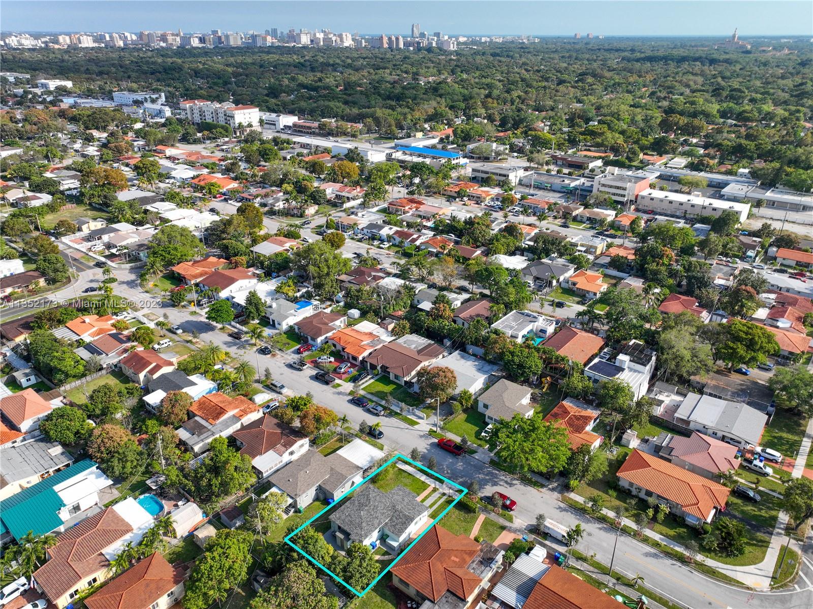 5571 Southwest 5th Terrace Miami, FL 33134 - Photo 36 of 37 an aerial view of residential houses with city view