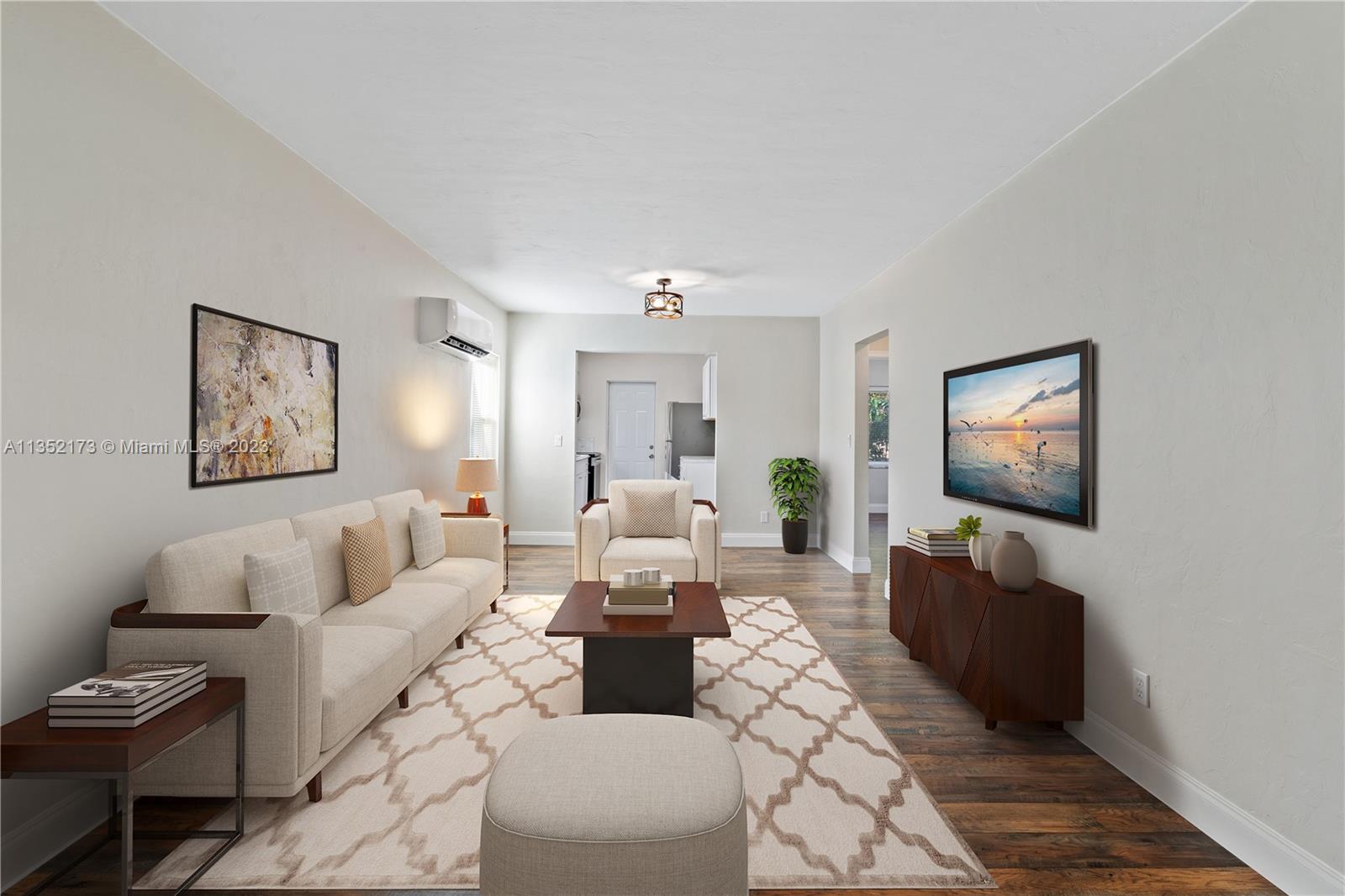 5571 Southwest 5th Terrace Miami, FL 33134 - Photo 9 of 37 a living room with furniture and a flat screen tv