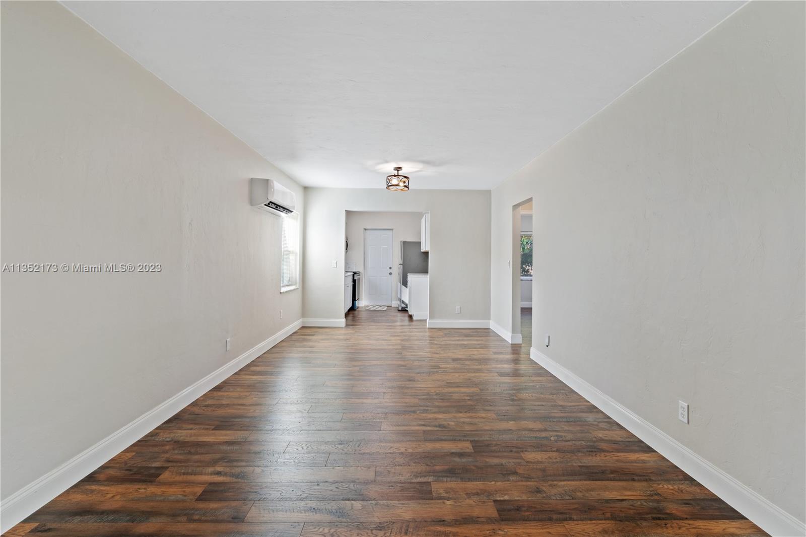 5571 Southwest 5th Terrace Miami, FL 33134 - Photo 10 of 37 a view of empty room with wooden floor