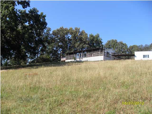 126 Smith Mountain Road Dunlap, TN 37327 - Photo 1 of 16 Primary Photo