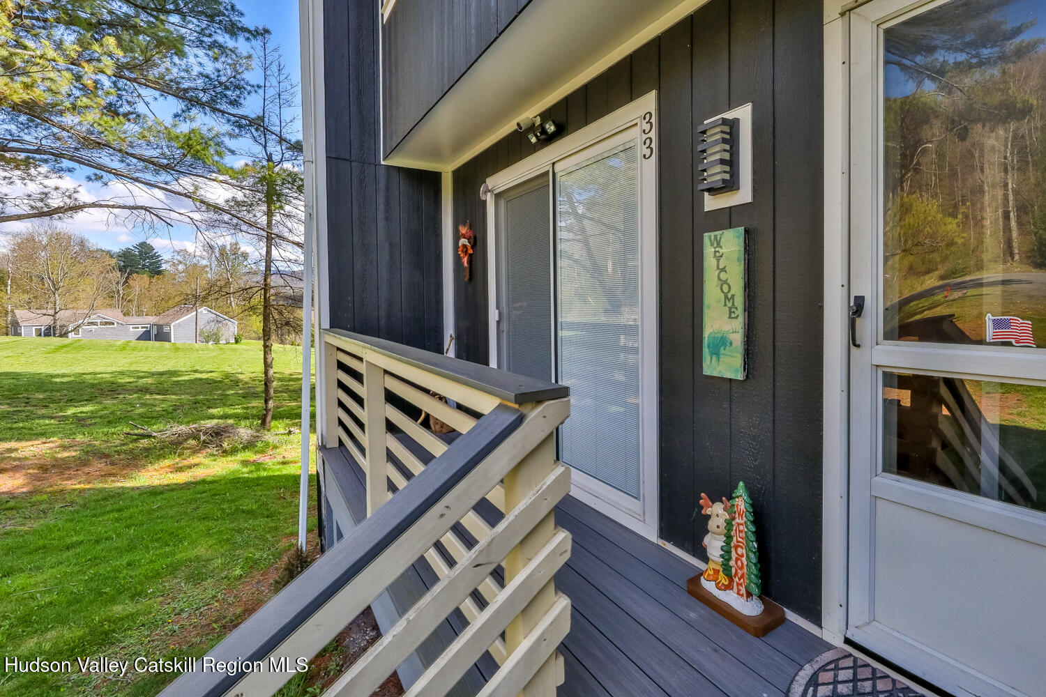 33 Scribner Hollow Road, Unit E4 Hunter, NY 12442 - Photo 1 of 44 a view of an outdoor space and deck with a backyard