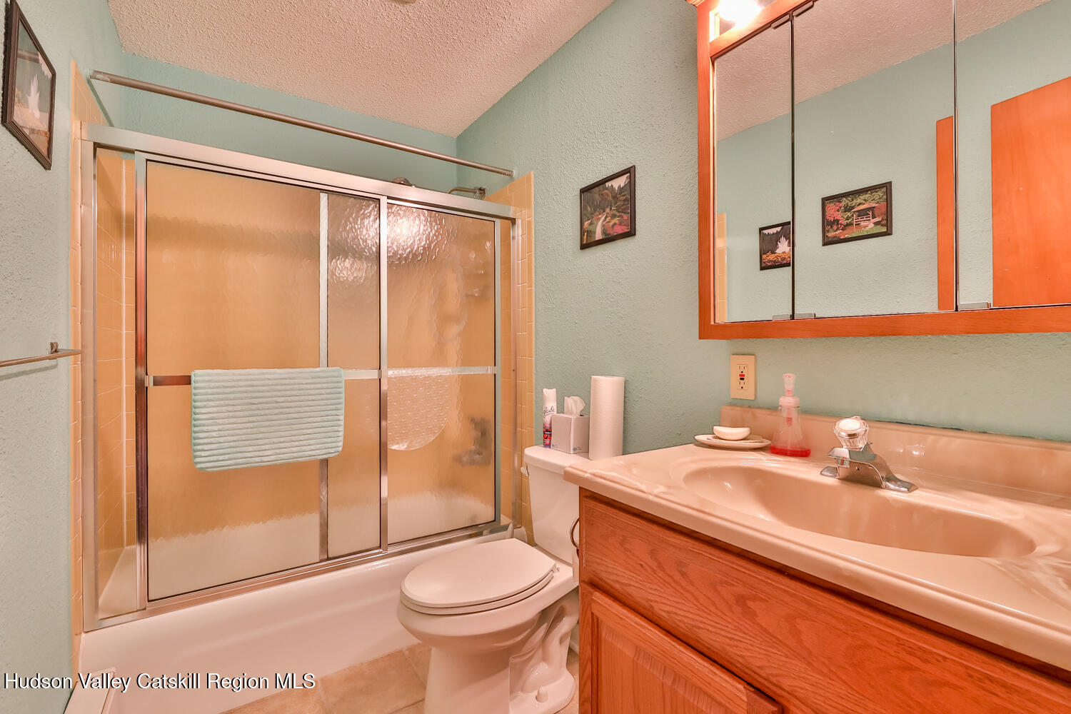 33 Scribner Hollow Road, Unit E4 Hunter, NY 12442 - Photo 34 of 44 a bathroom with a sink toilet and shower