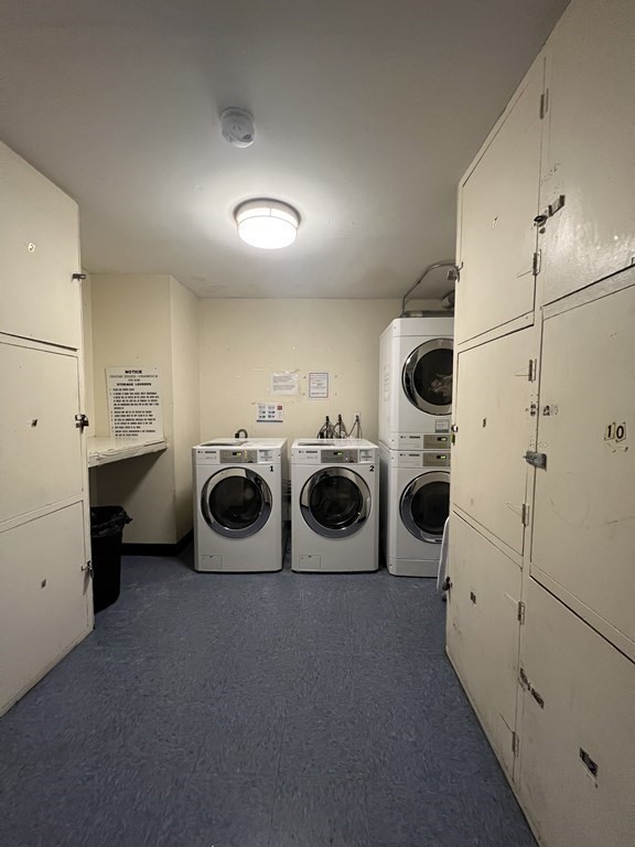1 Universal Street, Unit 7 Framingham, MA 01702 - Photo 19 of 23 a utility room with dryer and washer