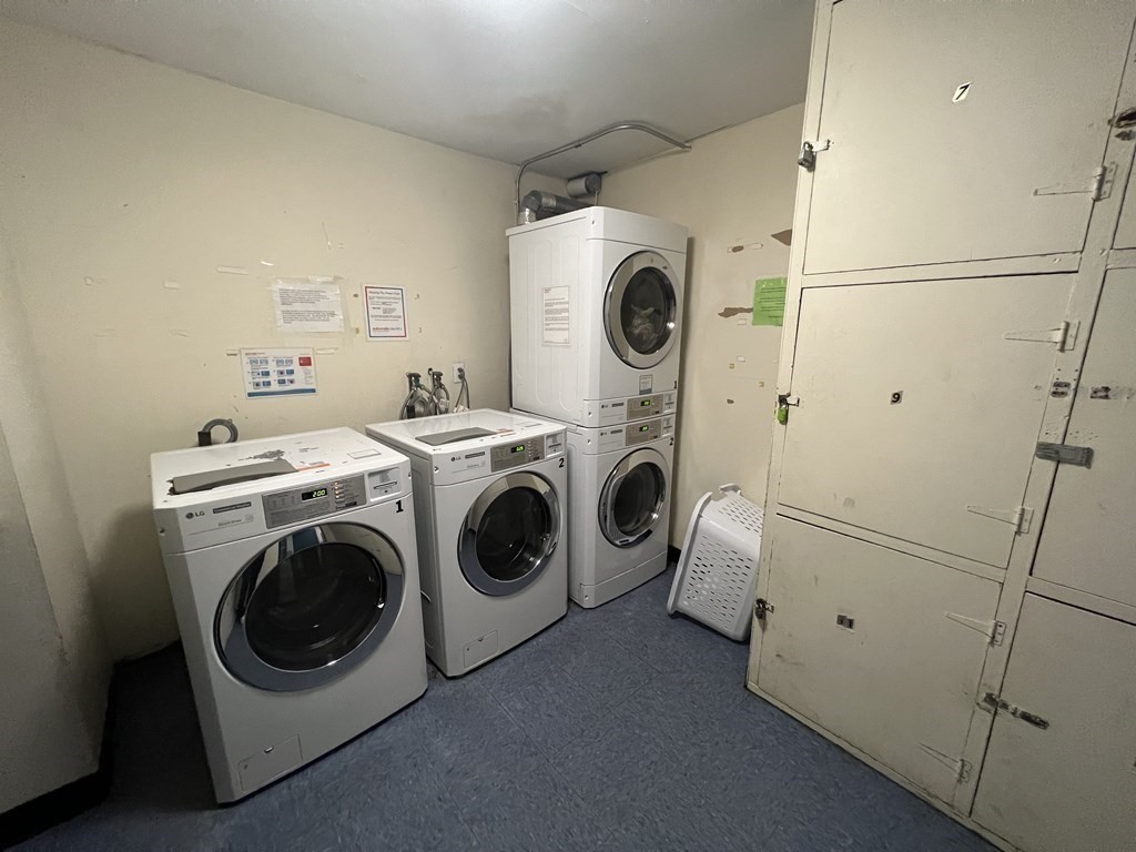 1 Universal Street, Unit 7 Framingham, MA 01702 - Photo 20 of 23 a utility room with dryer and washer