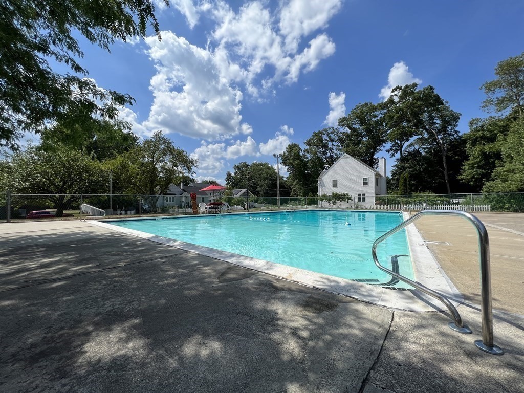 1 Universal Street, Unit 7 Framingham, MA 01702 - Photo 21 of 23 a view of a swimming pool with a yard