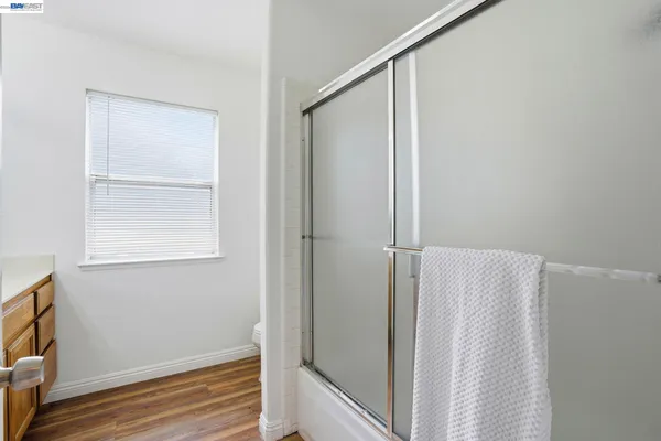 a view of front door with wooden floor