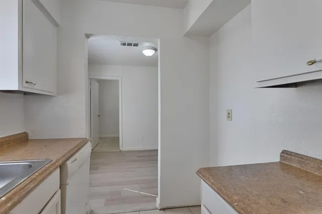 a view of kitchen and utility room