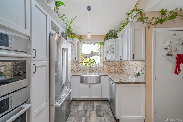 $589,900 | 275 North Titmus Drive, Mastic, NY 11950