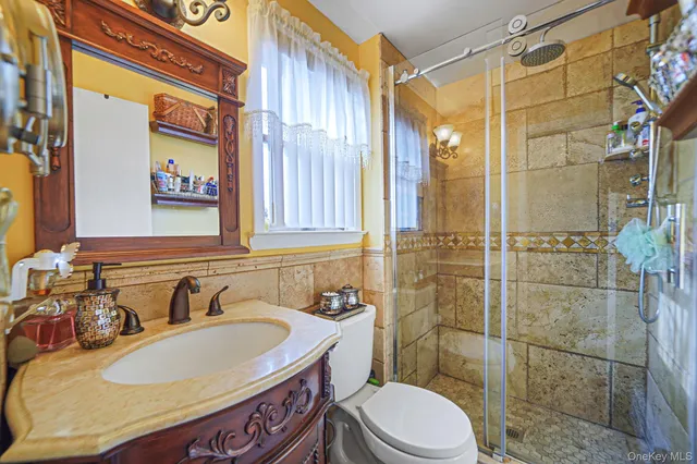 $589,900 | 275 North Titmus Drive, Mastic, NY 11950