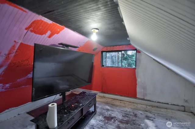 a room with a table and chairs