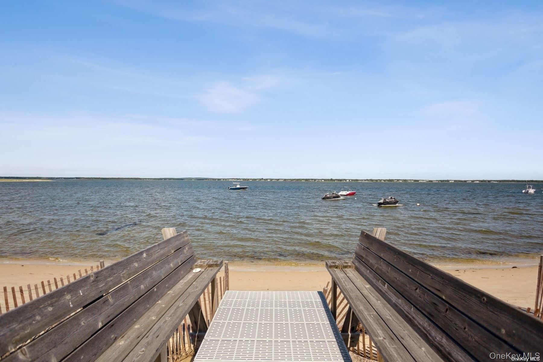 676 Dune Road West Hampton Dunes, NY 11978 - Photo 19 of 20 a view of an ocean from a balcony