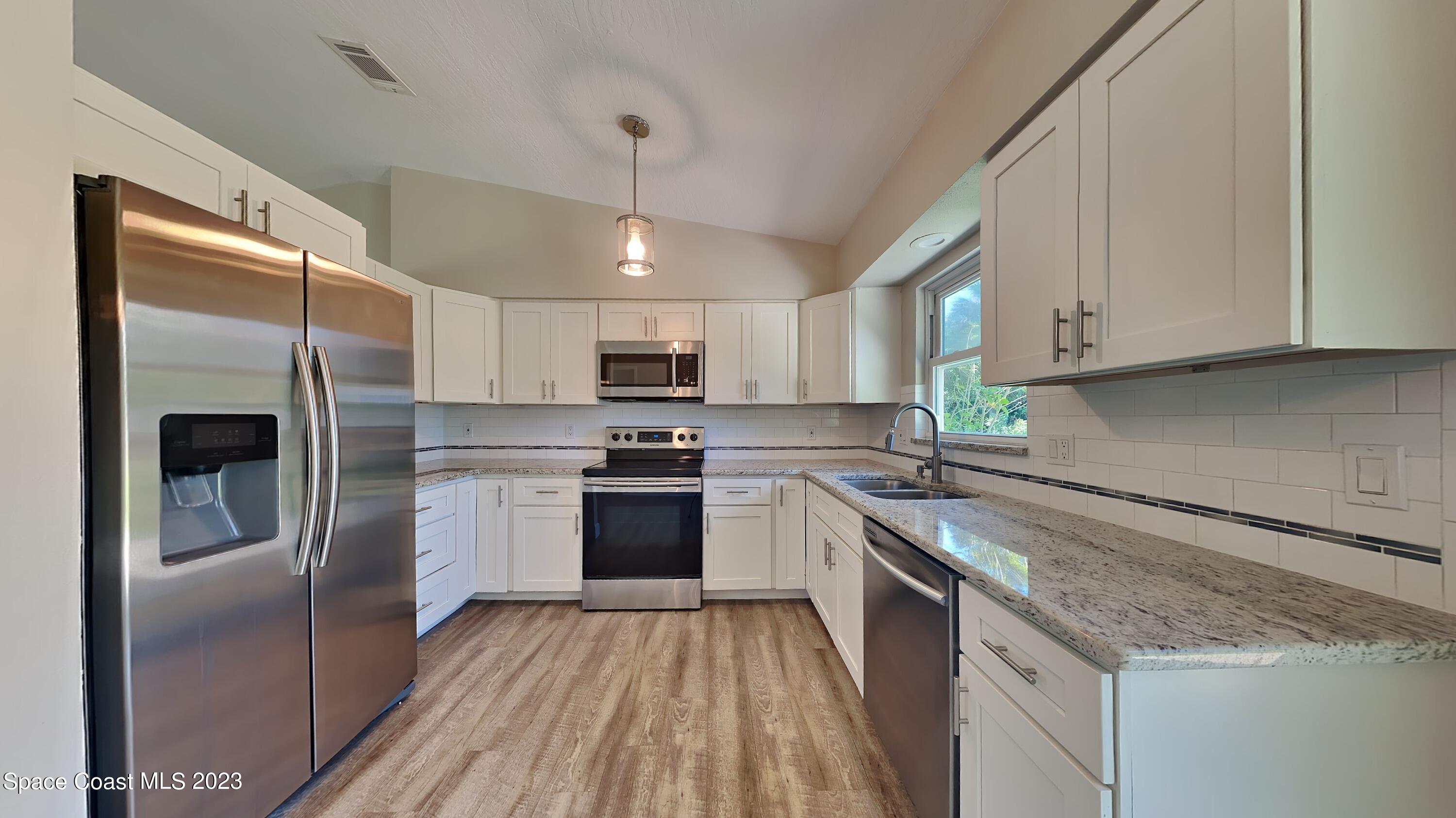 622 Degroodt Road Southwest Palm Bay, FL 32908 - Photo 6 of 15 7_Image_Koo2lA8uG5