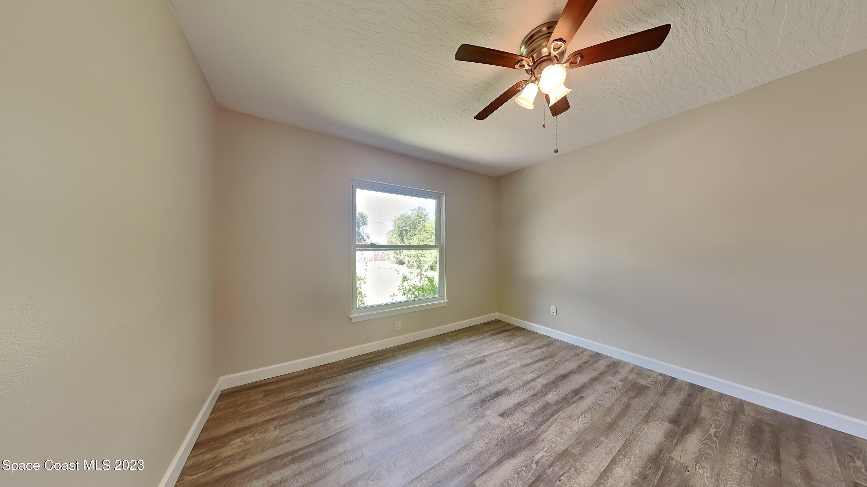 622 Degroodt Road Southwest Palm Bay, FL 32908 - Photo 7 of 15 8_Image_QkLxspckKt