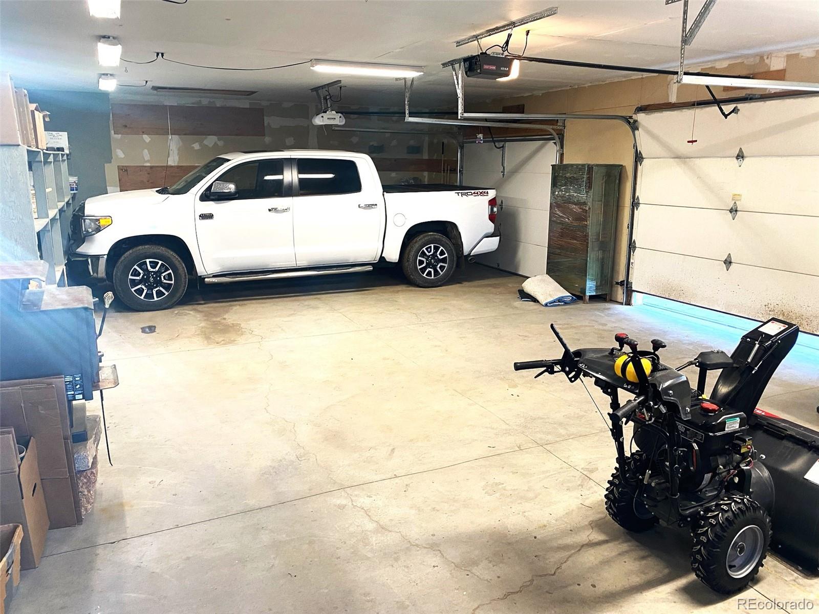5076 Campfire Road Hartsel, CO 80449 - Photo 30 of 35 a blue and white car parked in parking