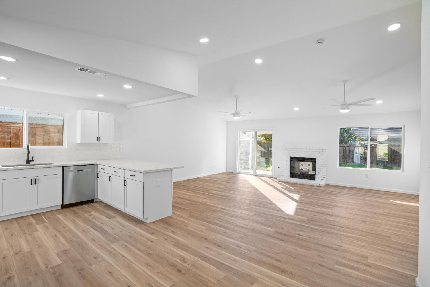 1509 Boothe Road Ceres, CA 95307 - Photo 11 of 28 a large kitchen with granite countertop a large counter top and sink