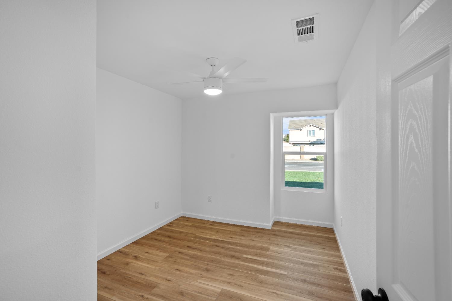 1509 Boothe Road Ceres, CA 95307 - Photo 22 of 28 a view of empty room with window