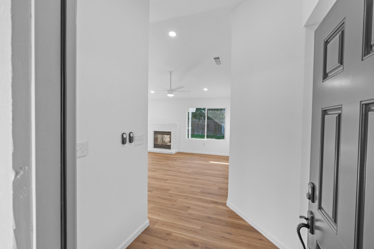 1509 Boothe Road Ceres, CA 95307 - Photo 3 of 28 a view of a hallway with wooden floor