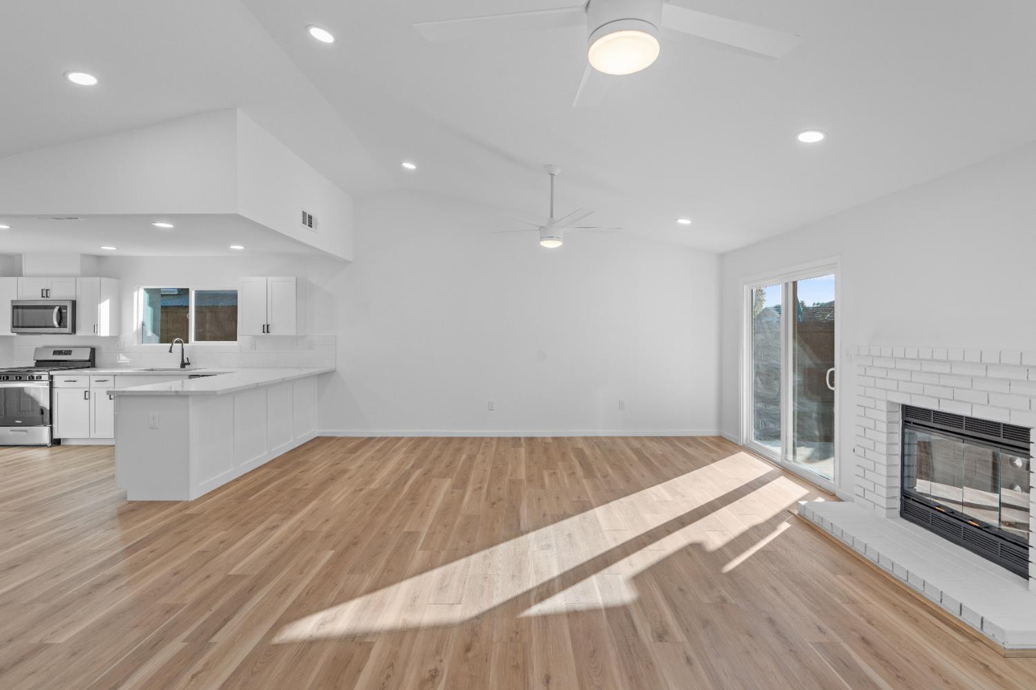1509 Boothe Road Ceres, CA 95307 - Photo 5 of 28 a view of kitchen with sink and microwave