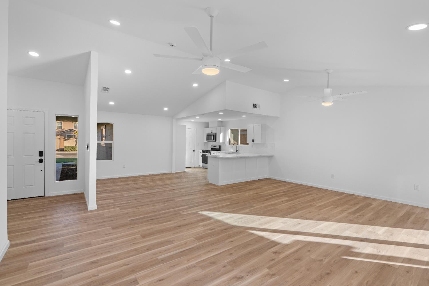 1509 Boothe Road Ceres, CA 95307 - Photo 6 of 28 a view of a kitchen with a sink and refrigerator