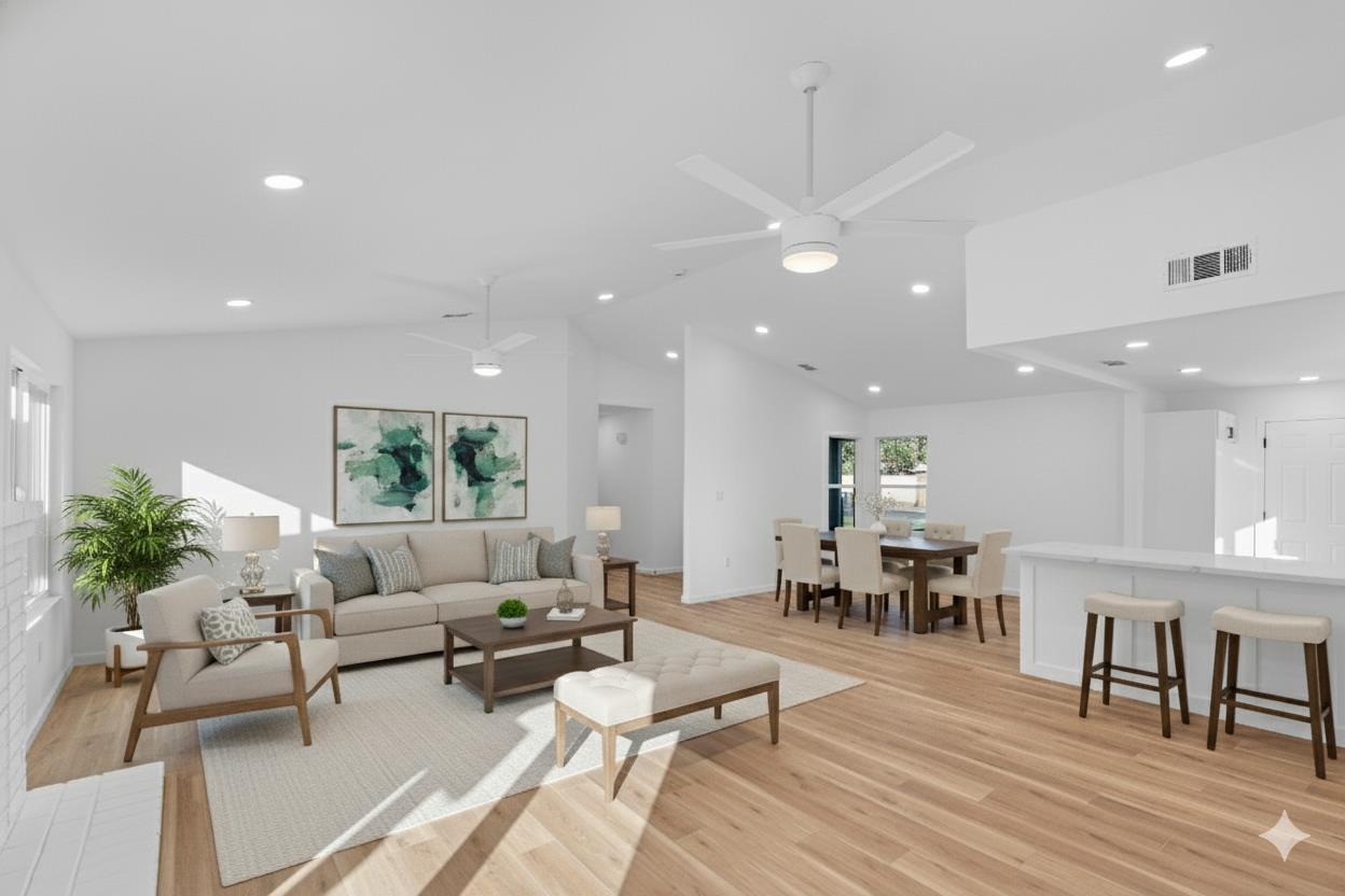 1509 Boothe Road Ceres, CA 95307 - Photo 7 of 28 a living room with furniture kitchen view and a wooden floor