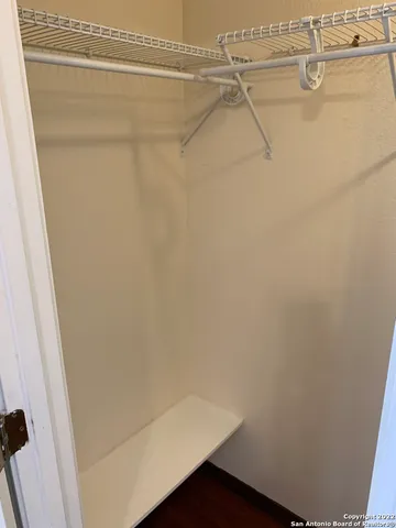 a view of a room with racks on the wall