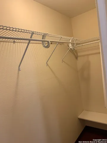 a view of a balcony with wooden floor