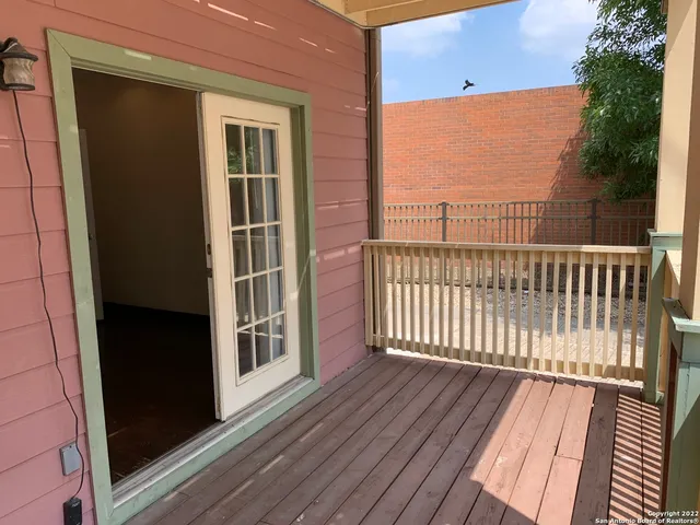 an empty room with closet area