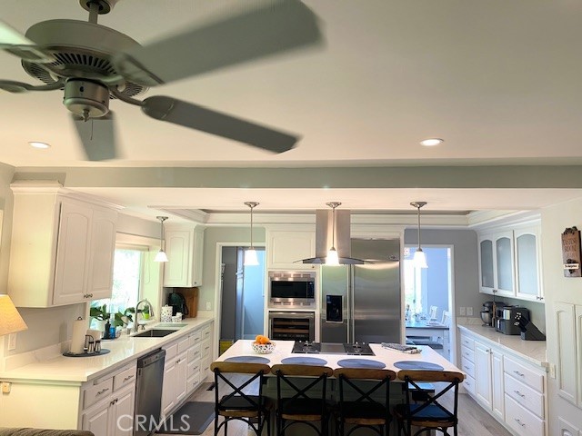 1 Cayuse Lane Rancho Palos Verdes, CA 90275 - Photo 13 of 28 a kitchen with a table and chairs in it