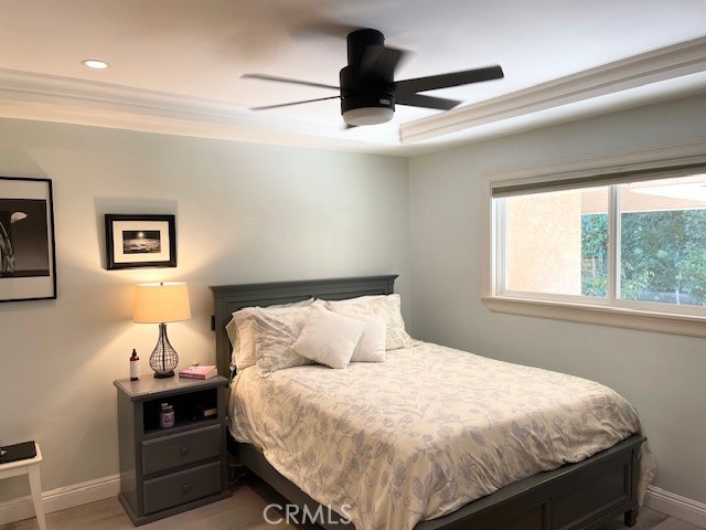1 Cayuse Lane Rancho Palos Verdes, CA 90275 - Photo 22 of 28 a bedroom with a bed and a chandelier