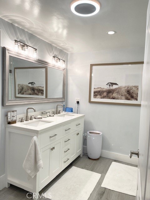 1 Cayuse Lane Rancho Palos Verdes, CA 90275 - Photo 24 of 28 a bathroom with a double vanity sink and a mirror