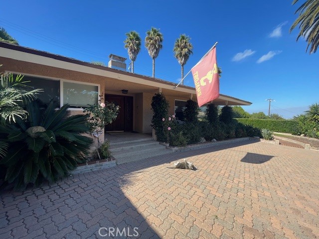 1 Cayuse Lane Rancho Palos Verdes, CA 90275 - Photo 4 of 28 a front view of a house with yard