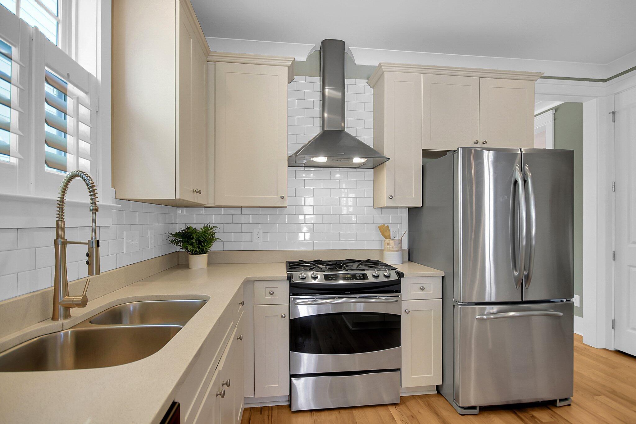 1311 Appling Drive Mount Pleasant, SC 29464 - Photo 17 of 62 Gas cooktop and vented hood