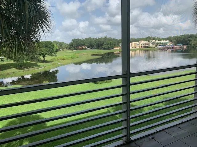 a view of a lake from a balcony