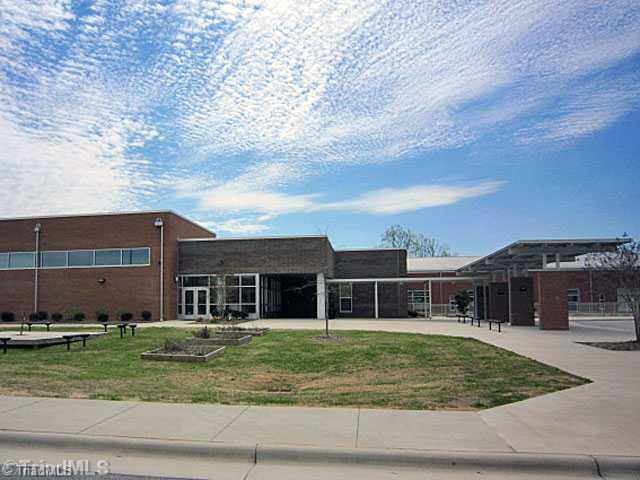 4716 Ridgefall Road Greensboro, NC 27410 - Photo 15 of 16 Exterior Front. Pearce Elementary School just a short distance away from home!