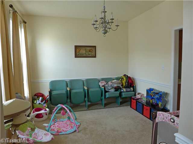 4716 Ridgefall Road Greensboro, NC 27410 - Photo 5 of 16 Dining Room. Being used for playroom right now.
