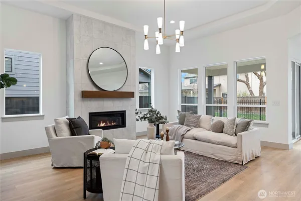 a bathroom with a double vanity sink mirror double and shower