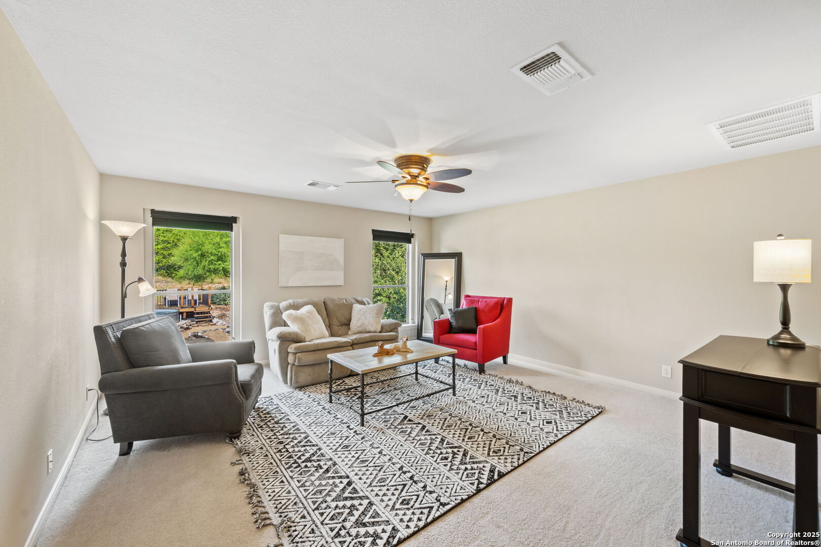 14507 John David Helotes, TX 78023 - Photo 16 of 49 a living room with furniture and a window