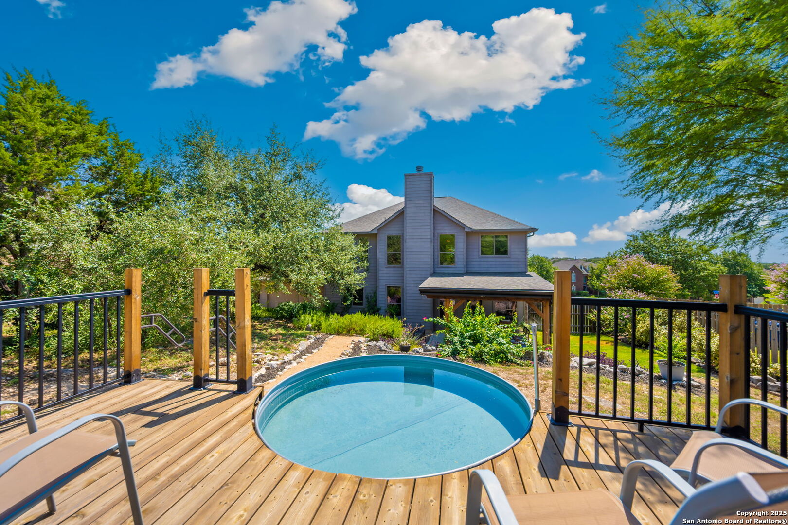 14507 John David Helotes, TX 78023 - Photo 26 of 49 a view of a swimming pool with a patio
