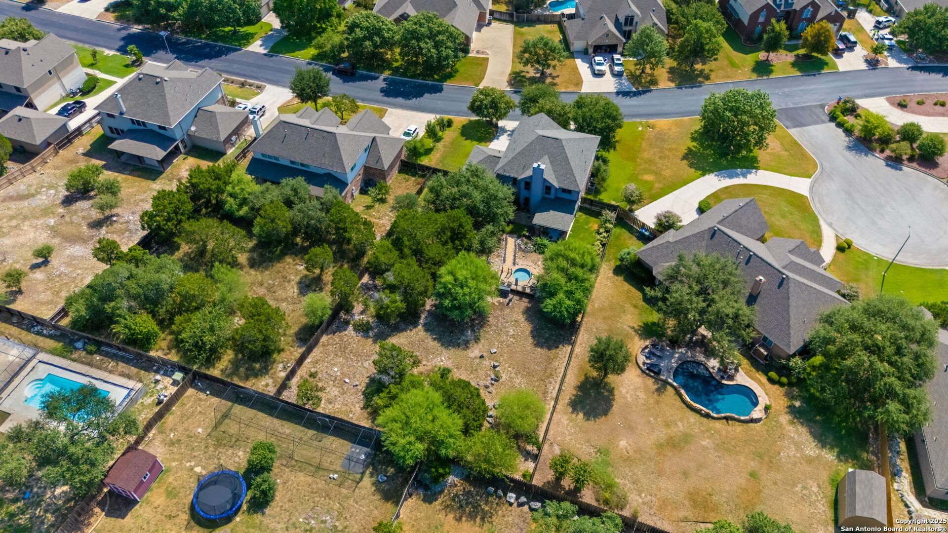14507 John David Helotes, TX 78023 - Photo 28 of 49 an aerial view of residential house with outdoor space and swimming pool