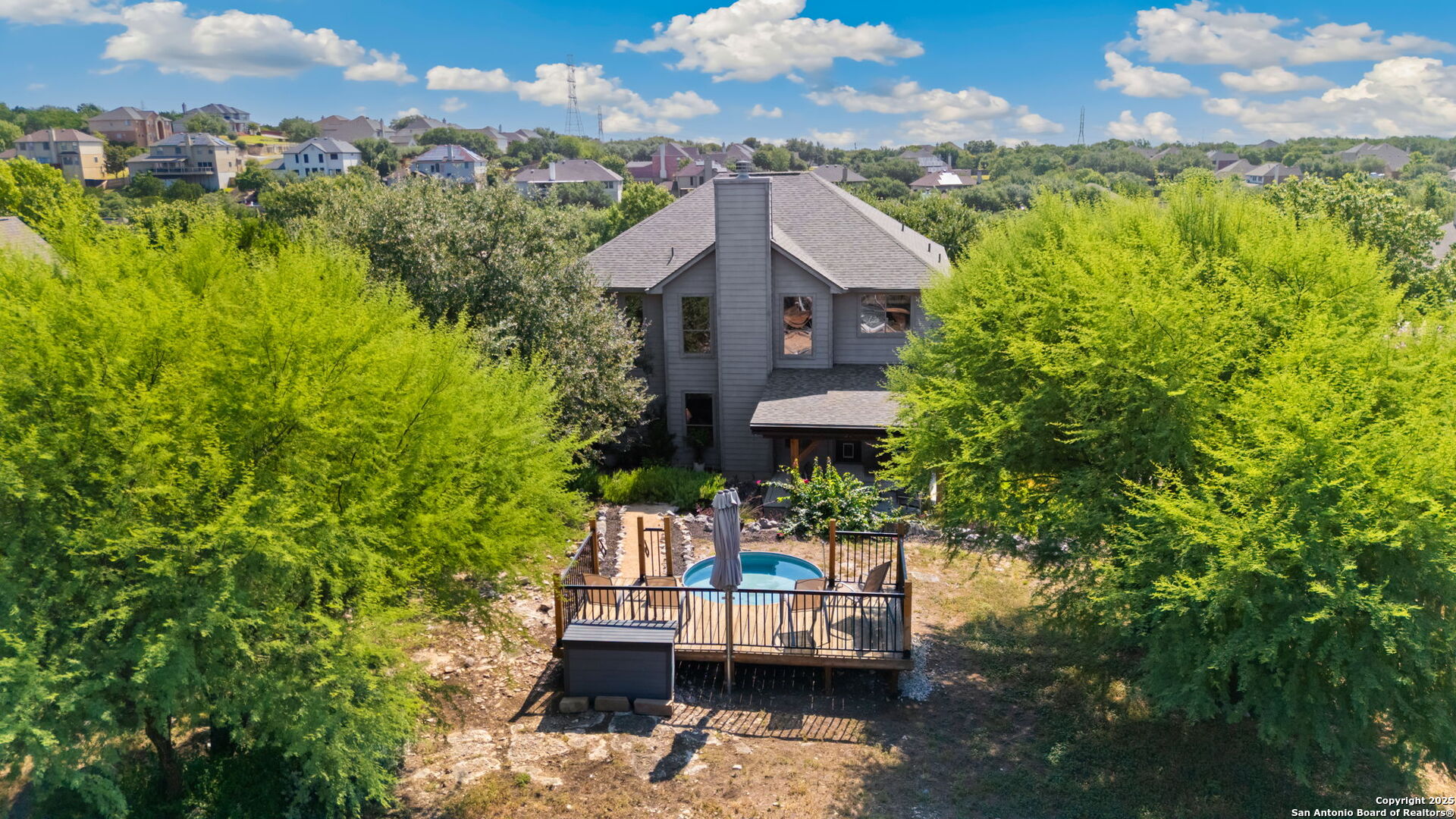 14507 John David Helotes, TX 78023 - Photo 30 of 49 a view of a house with a yard and sitting area