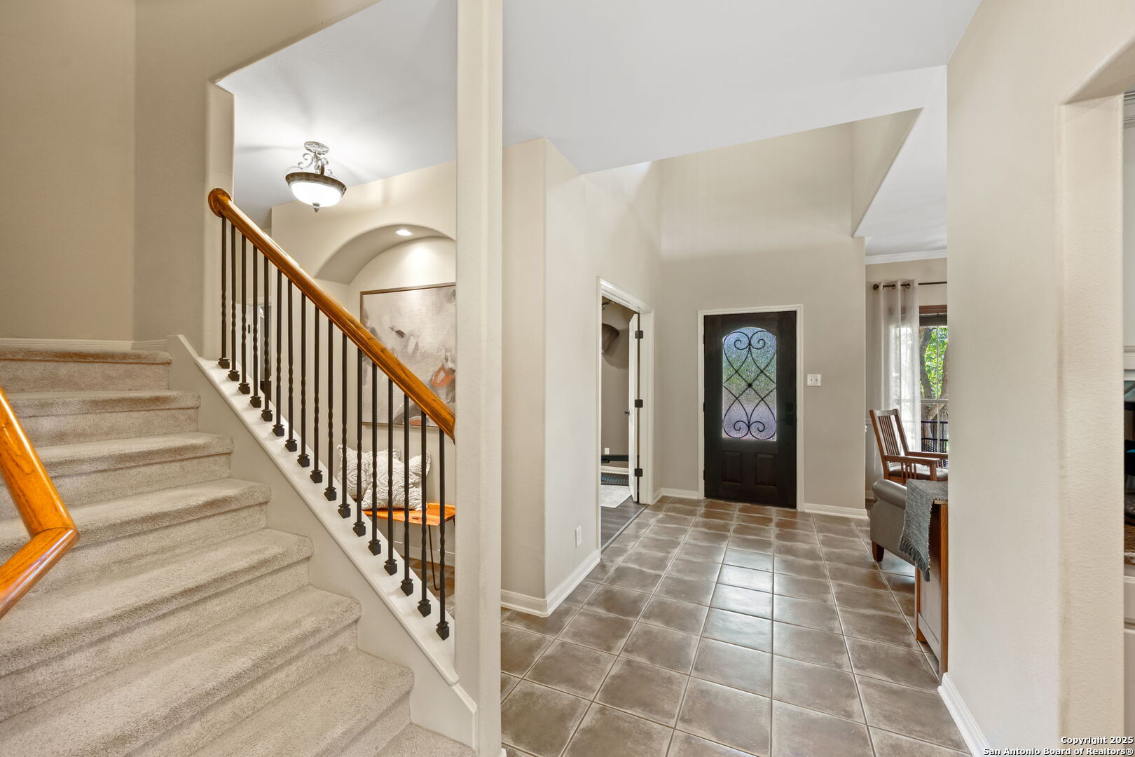 14507 John David Helotes, TX 78023 - Photo 35 of 49 a view of a hallway with wooden floor and staircase
