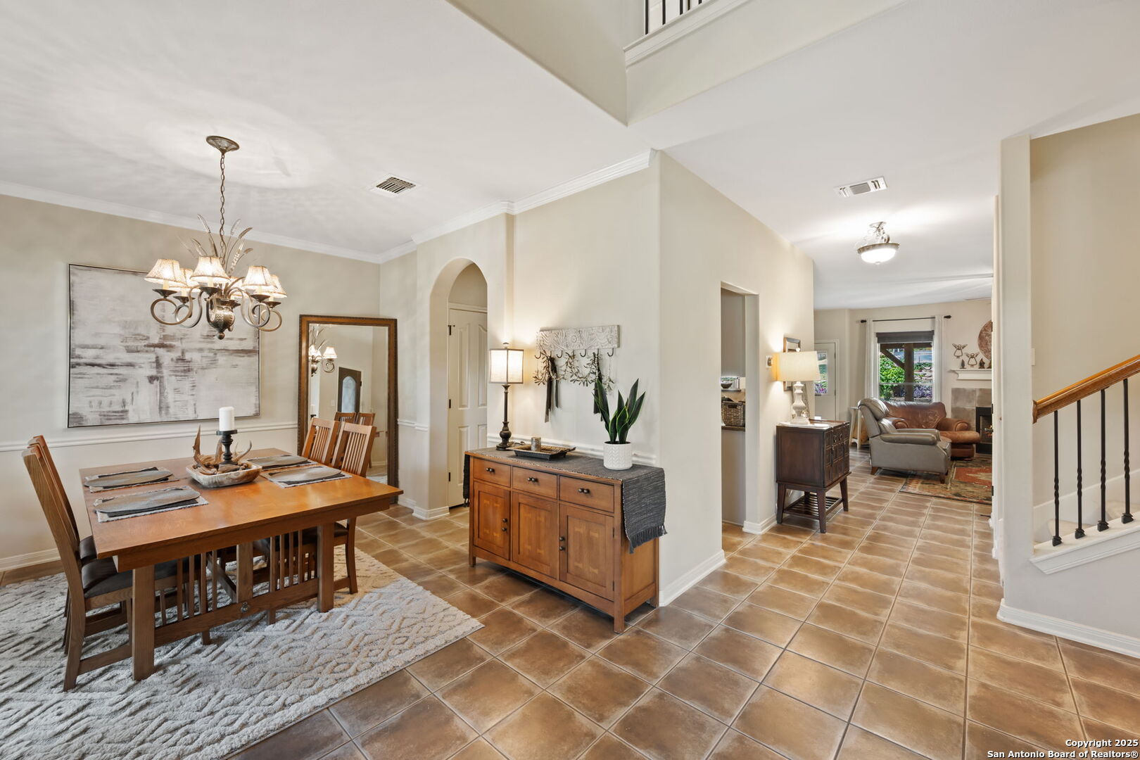 14507 John David Helotes, TX 78023 - Photo 36 of 49 a living room with furniture and a chandelier